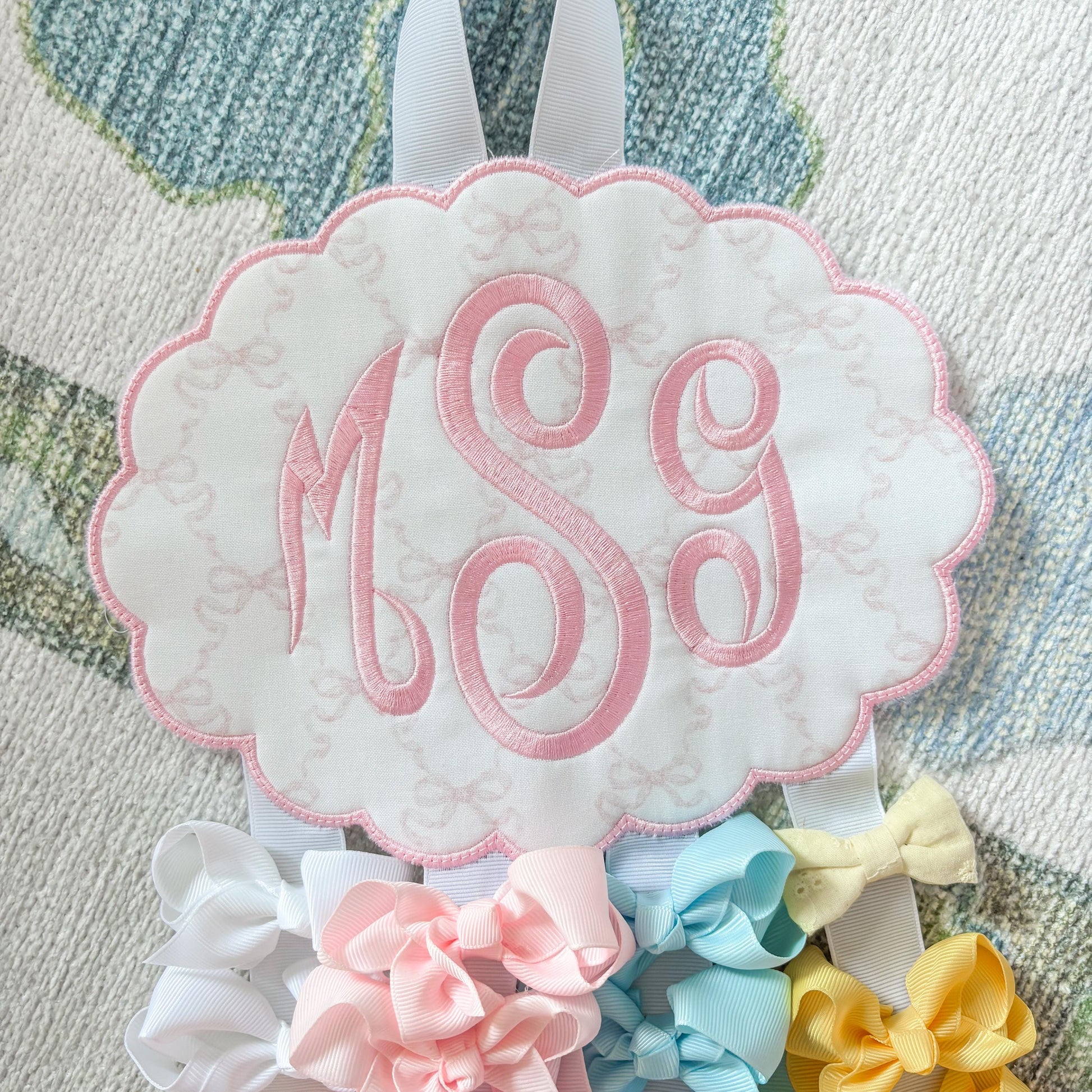 Embroidered Monogram Bow Holder: Scalloped Nursery Organizer